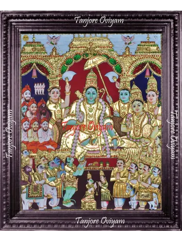 Ramar Pattabishegam Tanjore Painting depicting Lord Rama’s divine coronation with Sita, Lakshmana, Hanuman, and celestial figures in traditional gold foil detailing